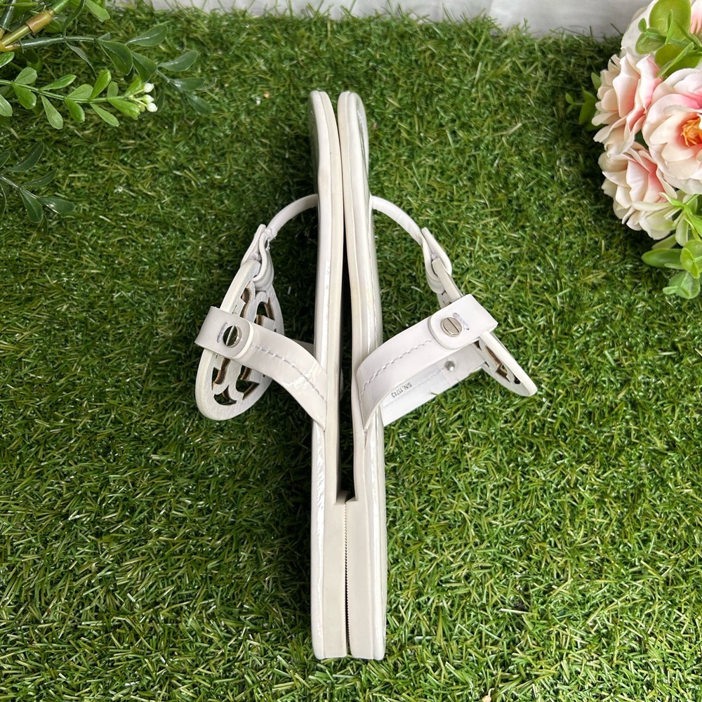 Tory Burch 
Miller cut-out leather flip-flops
$267 Sandals Sz 59 optical white - Picture 9 of 16
